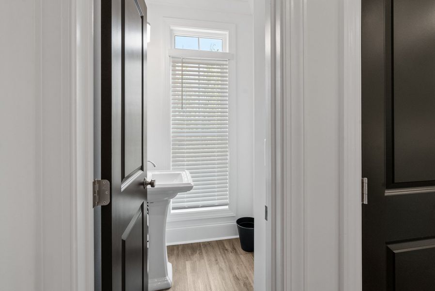 Representative furnished interior of a home built from the The Barnsley I by The Providence Group in IveyBrooke, Alpharetta (Image 28).