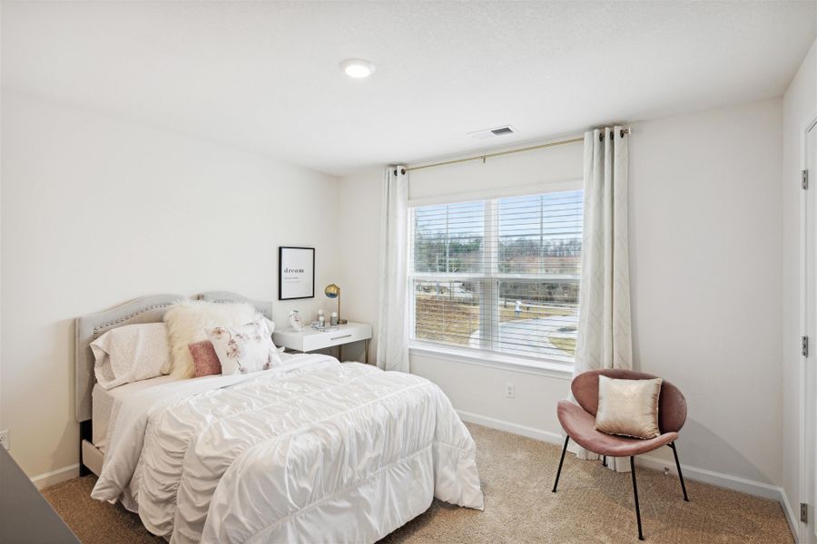 Representative furnished interior of a home built from the Hayden by D.R. Horton in Hillcrest Landing, McDonald (Image 24).