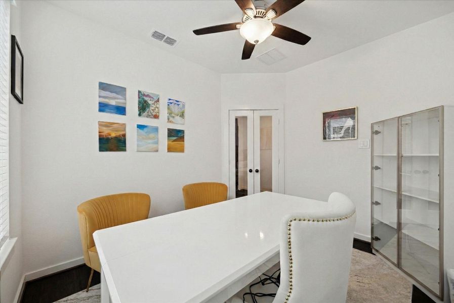 THIS OFFICE VIEW SHOWS THE WHITE DOUBLE FRECH DOOR ACCESS.