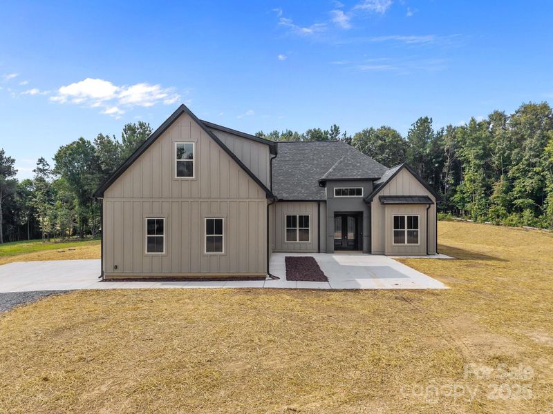 Front exterior of a new home in , Peachland, NC, highlighting curb appeal (Image 24). Front exterior of a new home in , Peachland, NC, highlighting curb appeal (Image 24).