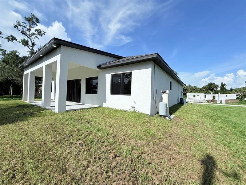 Exterior details and patio area of a home in , Port Charlotte (Image 22).