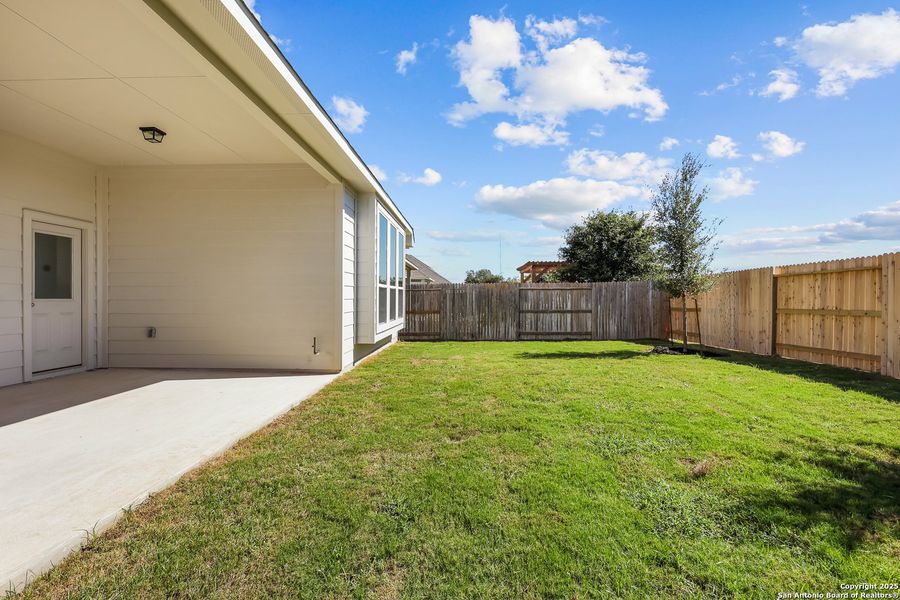 Exterior details and patio area of a home in Stillwater Ranch 45', San Antonio (Image 22). Exterior details and patio area of a home in Stillwater Ranch 45', San Antonio (Image 22).