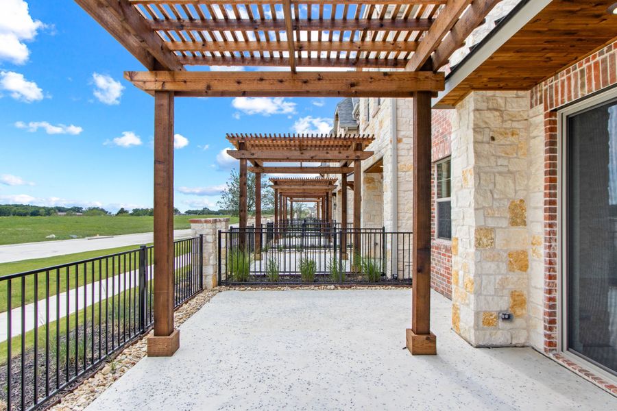 Exterior details and patio area of a home in The Tribute, The Colony (Image 3).