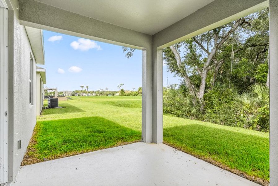 Exterior details and patio area of a home in Eden Hills, Lake Alfred (Image 31).