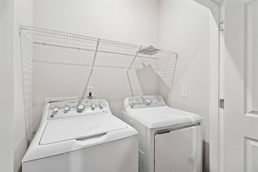Representative furnished interior of a home built from the Holden by Tri Pointe Homes in Mews at Holding Village, Wake Forest (Image 8).