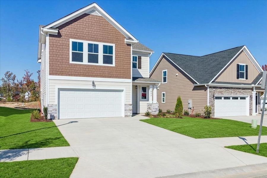 Front exterior of a new home in Tillery Park, Grovetown, GA, highlighting curb appeal (Image 23). Front exterior of a new home in Tillery Park, Grovetown, GA, highlighting curb appeal (Image 23).