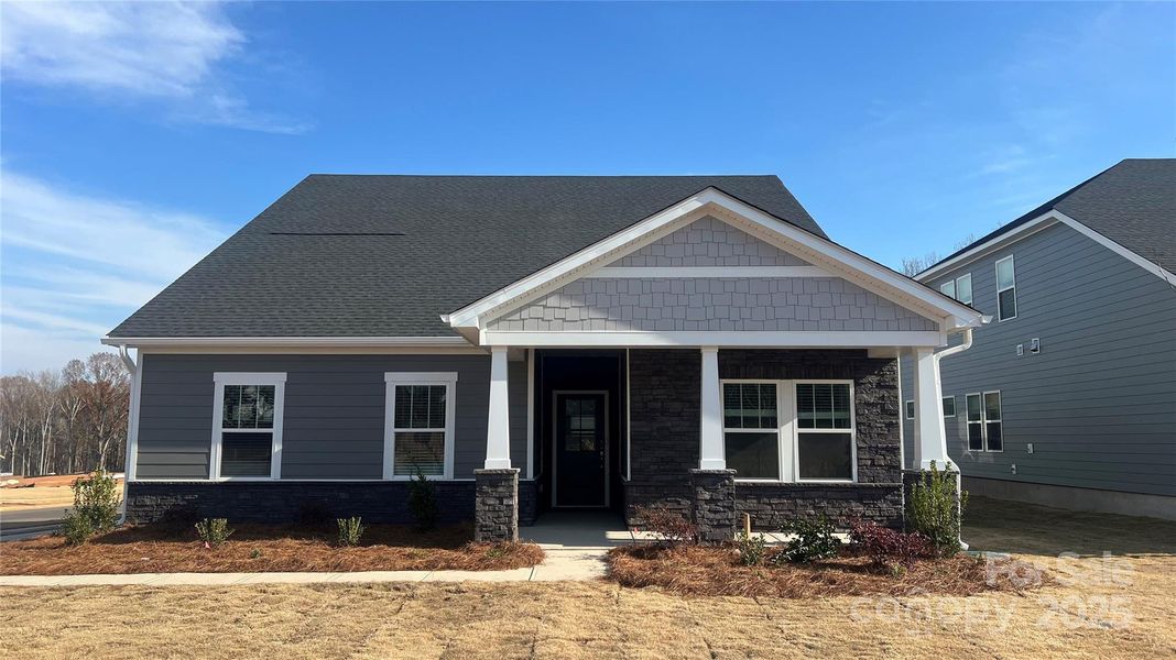 Front exterior of a new home in Brighton Springs, York, SC, highlighting curb appeal (Image 1). Front exterior of a new home in Brighton Springs, York, SC, highlighting curb appeal (Image 1).
