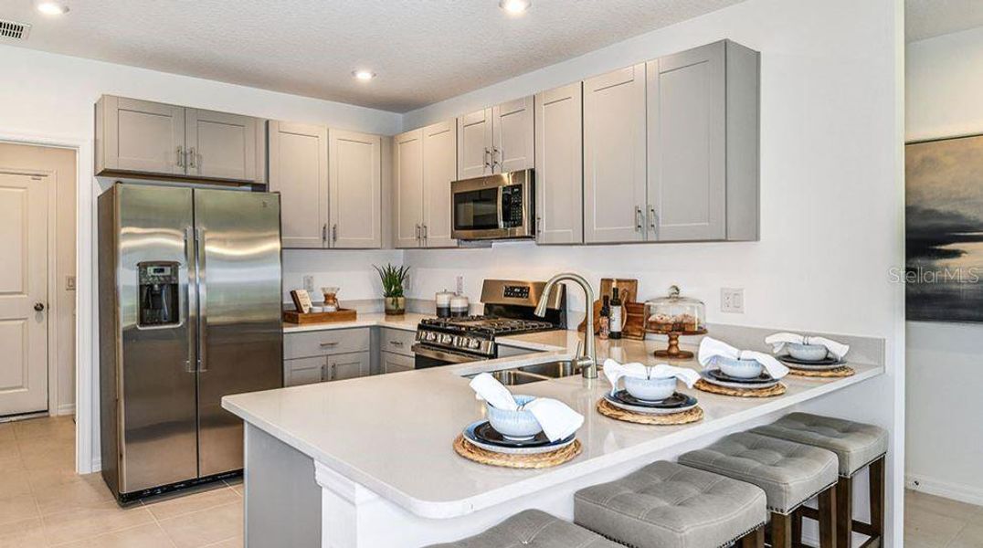 Furnished interior view inside a new home in Cove at Coasterra, Palmetto (Image 8).