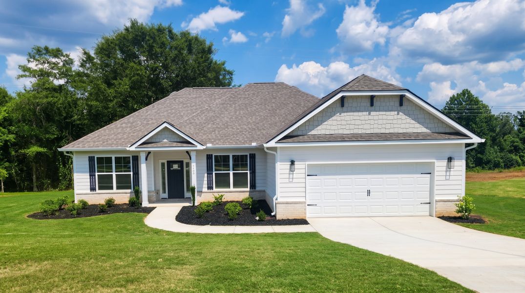 Front exterior of a new home in Holliday Pass, Griffin, GA, highlighting curb appeal (Image 1). Front exterior of a new home in Holliday Pass, Griffin, GA, highlighting curb appeal (Image 1).