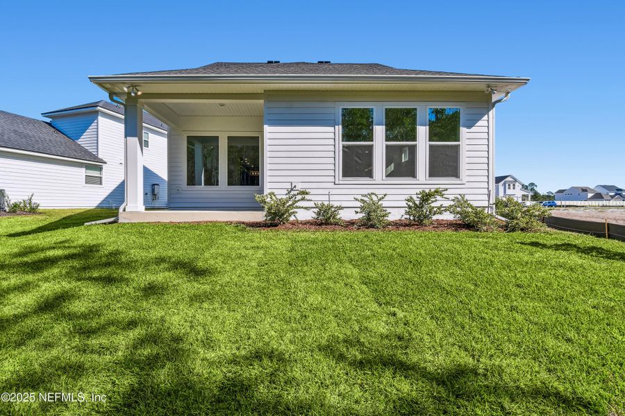 Exterior details and patio area of a home in Seabrook Village 40' Front Entry, Nocatee (Image 4).