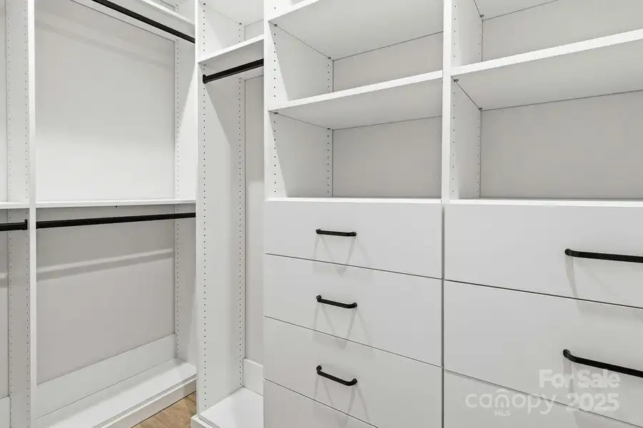 Custom cabinetry throughout with premium finishes and storage