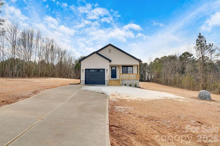 Front exterior of a new home in , Lincolnton, NC, highlighting curb appeal (Image 1). Front exterior of a new home in , Lincolnton, NC, highlighting curb appeal (Image 1).