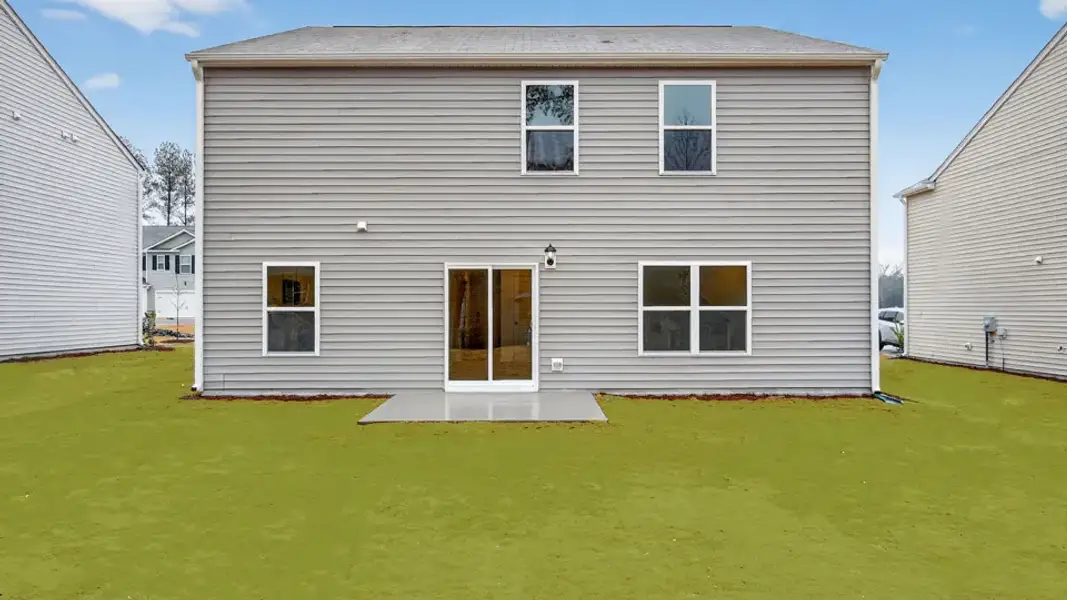 Exterior details and patio area of a home in Mangum Farms, Stem (Image 23).