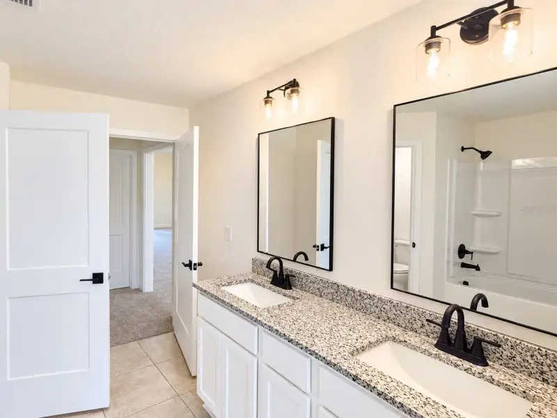 Furnished interior view inside a new home in Harmony Central, St. Cloud (Image 7).