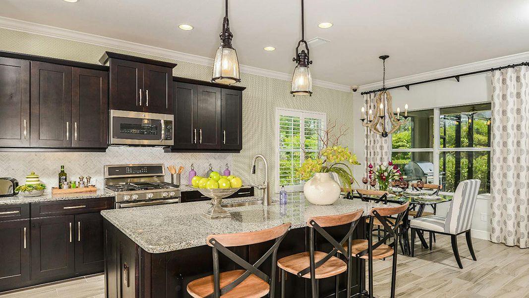 Furnished interior view inside a new home in SkySail Real Estate and Homes for Sale in Naples, FL - Neal Communities, Naples (Image 4).