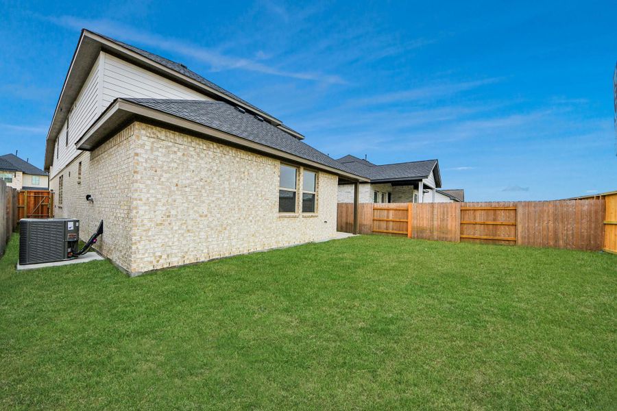 Exterior details and patio area of a home in Elyson, Katy (Image 2).