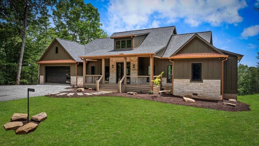 Exterior details and patio area of a home in , Mineral Bluff (Image 25).