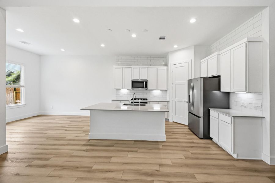 Furnished interior view inside a new home in Hills of Westlake, Conroe (Image 10).