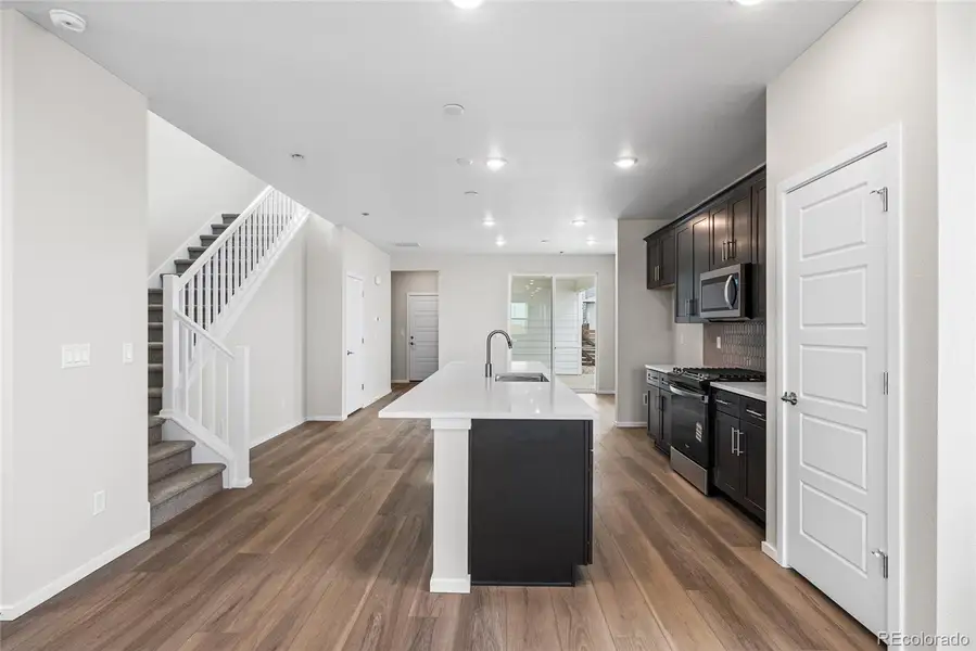 Furnished interior view inside a new home in Barefoot Village, Firestone (Image 7).