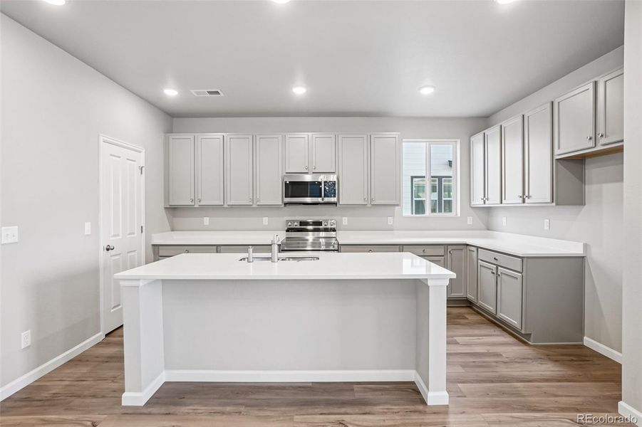 Furnished interior view inside a new home in Parkway at Prairie Center Village, Brighton (Image 13).