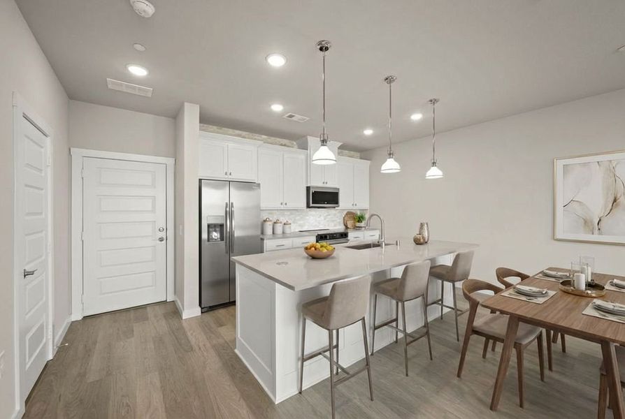 Furnished interior view inside a new home in Wildridge, Oak Point (Image 6).