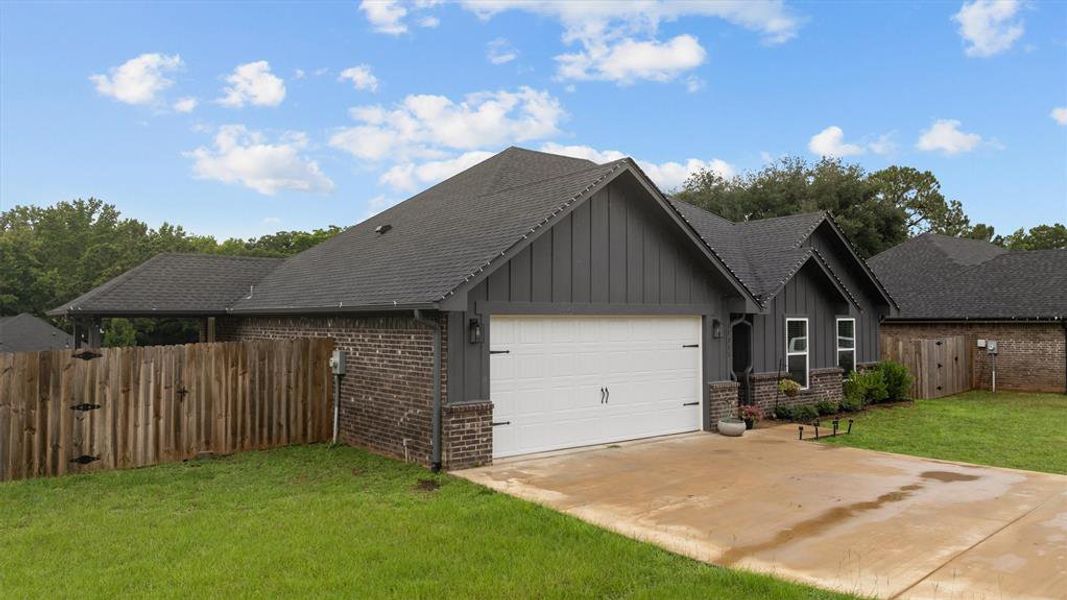 Front exterior of a new home in , Lindale, TX, highlighting curb appeal (Image 17).