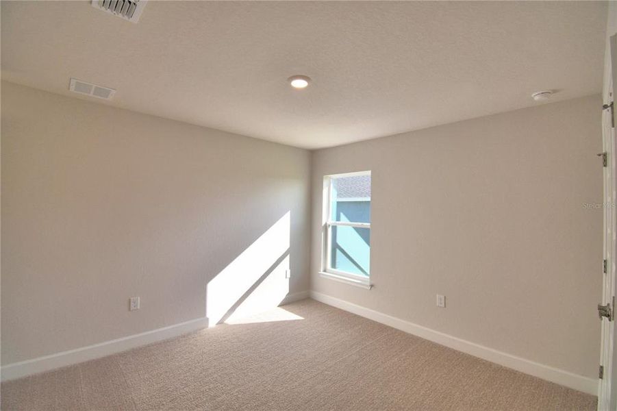 Spacious, unfurnished interior of a new home in Cadence Crossing, Auburndale (Image 39).