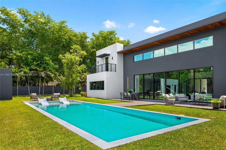 Front exterior of a new home in , Pinecrest, FL, highlighting curb appeal (Image 29).