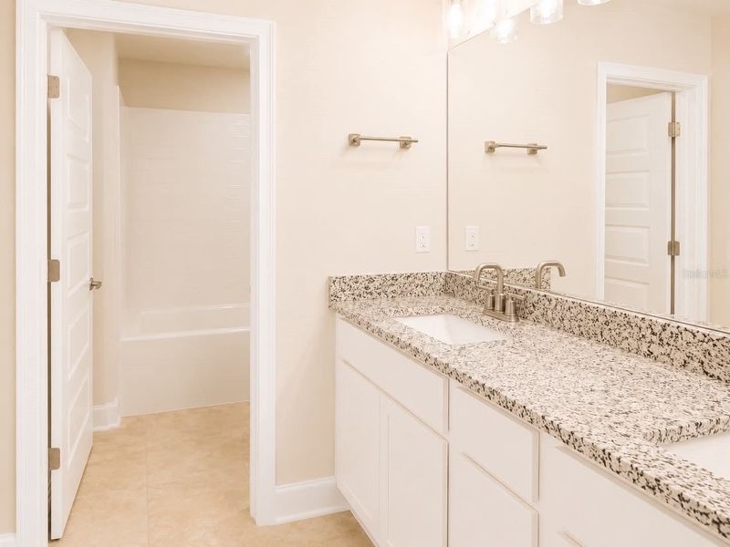 Furnished interior view inside a new home in Harmony Central, St. Cloud (Image 7).