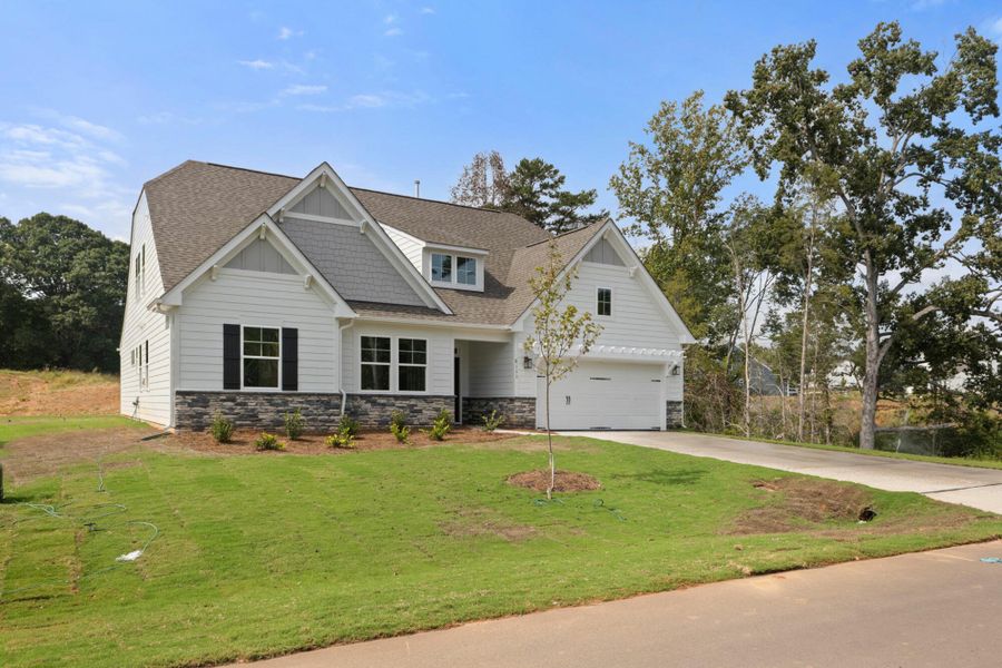 Front exterior of a new home in Grove Park, Clemmons, NC, highlighting curb appeal (Image 23).