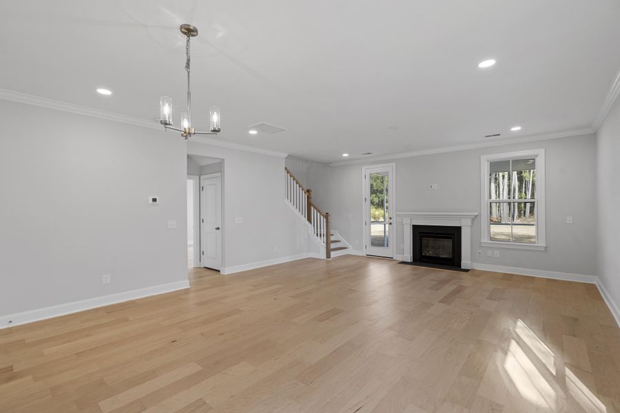 Spacious, unfurnished interior of a new home in K. Hovnanian's® Four Seasons at Lakes of Cane Bay, Summerville (Image 14).