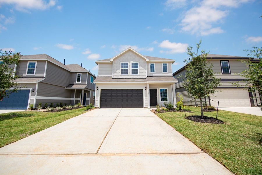 Front exterior of a new home in Cliffstone Hills, Conroe, TX, highlighting curb appeal (Image 12). Front exterior of a new home in Cliffstone Hills, Conroe, TX, highlighting curb appeal (Image 12).