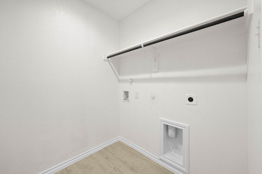 Representative exterior photo of a completed home built from the Cheyenne by Impression Homes in ValleyBrooke, Mesquite, TX (Image 24).