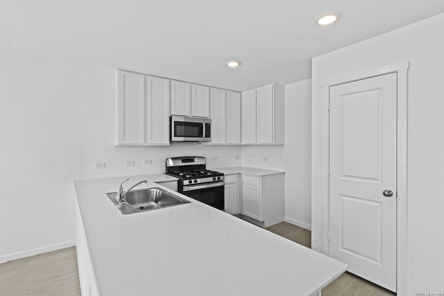 Furnished interior view inside a new home in Spring Grove, St. Hedwig (Image 8).