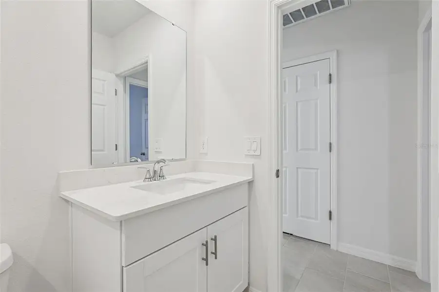 Furnished interior view inside a new home in Lake Deer Estates - Signature Series, Poinciana (Image 7).