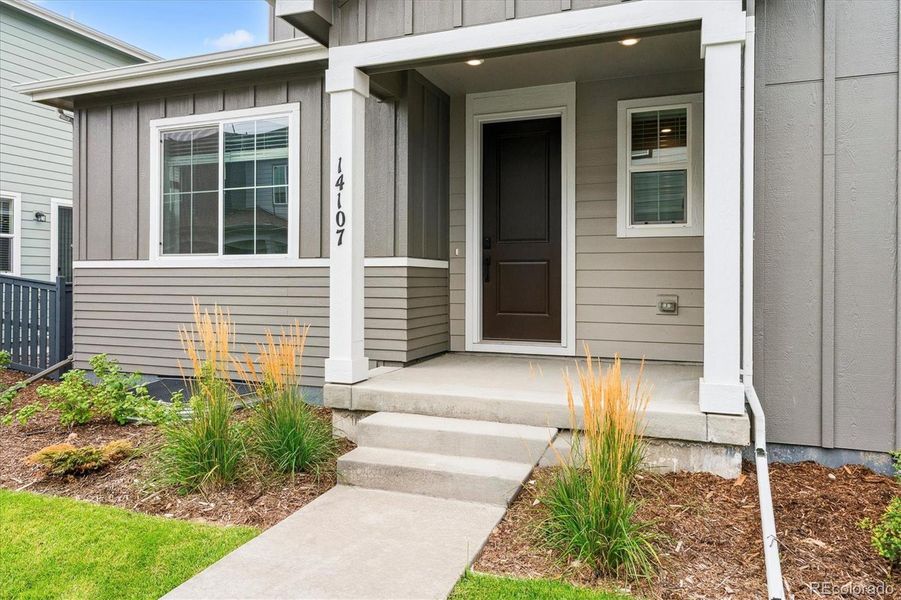 Exterior details and patio area of a home in Paired Homes at Alder Creek, Parker (Image 3). Exterior details and patio area of a home in Paired Homes at Alder Creek, Parker (Image 3).