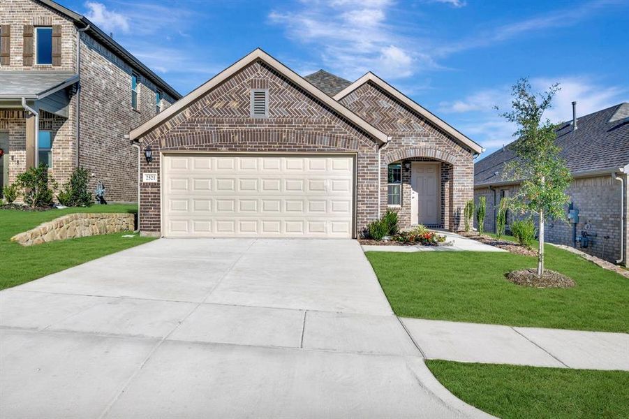 Front exterior of a new home in ValleyBrooke, Mesquite, TX, highlighting curb appeal (Image 21). Front exterior of a new home in ValleyBrooke, Mesquite, TX, highlighting curb appeal (Image 21).