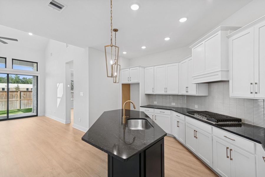 Furnished interior view inside a new home in The Highlands 40', Porter (Image 3).