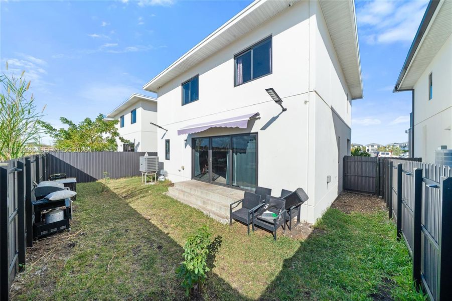 Exterior details and patio area of a home in , Florida City (Image 3).