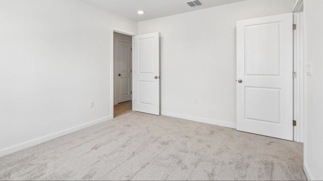 Furnished interior view inside a new home in Cyrene at Harmony, St. Cloud (Image 16).
