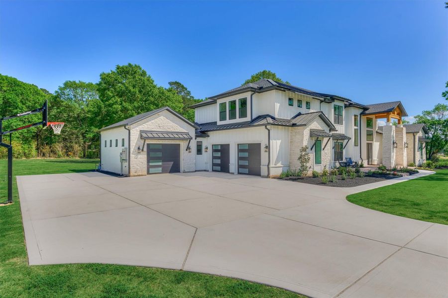 Front exterior of a new home in , Montgomery, TX, highlighting curb appeal (Image 22).