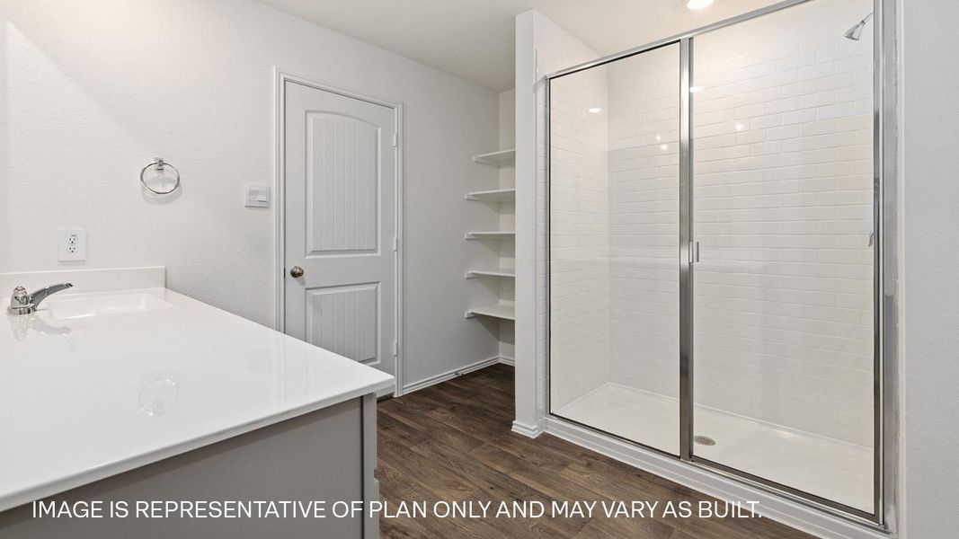 Representative furnished interior of a home built from the The Fairfield by D.R. Horton in Watermill, Uhland (Image 8).