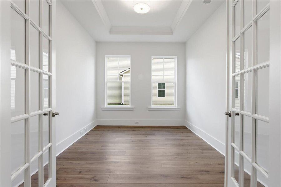 Spacious, unfurnished interior of a new home in Summerwind Crossing at Lakes of Cane Bay, Summerville (Image 11).