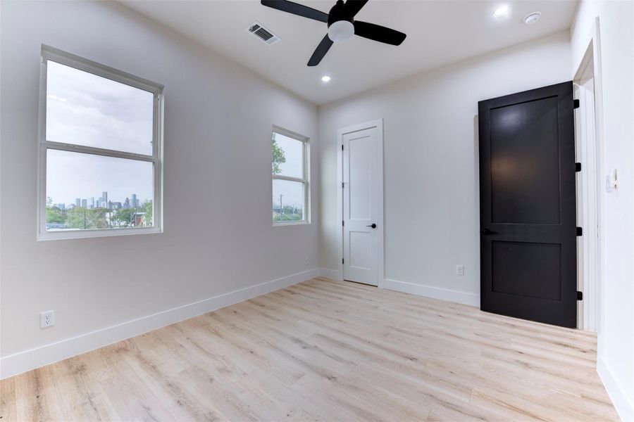 Secondary bedroom with beautiful black door Secondary bedroom with beautiful black door