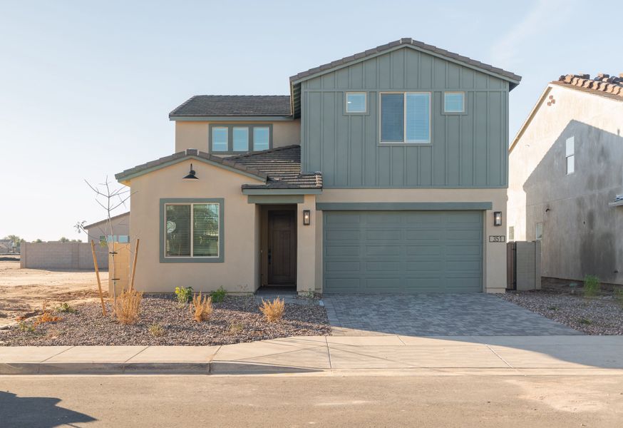 Front exterior of a new home in Terraza, San Tan Valley, AZ, highlighting curb appeal (Image 1). Front exterior of a new home in Terraza, San Tan Valley, AZ, highlighting curb appeal (Image 1).