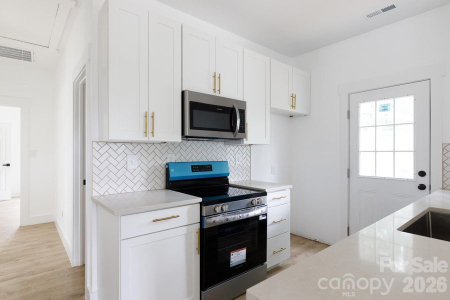 Furnished interior view inside a new home in , Great Falls (Image 5).