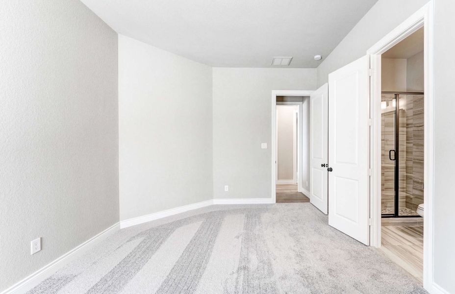 Representative unfurnished interior of a home built from the 2870 by Ravenna Homes in The Woodlands Hills 65′, Willis (Image 39). Representative unfurnished interior of a home built from the 2870 by Ravenna Homes in The Woodlands Hills 65′, Willis (Image 39).