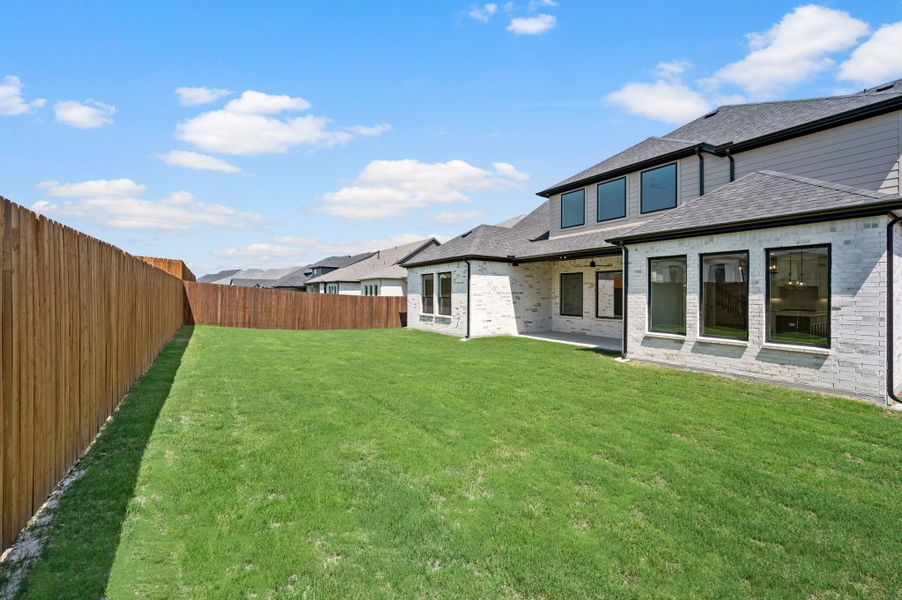 Exterior details and patio area of a home in Parks of Aledo, Aledo (Image 27).