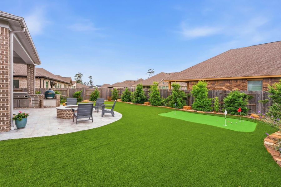 Exterior details and patio area of a home in , Conroe (Image 3).