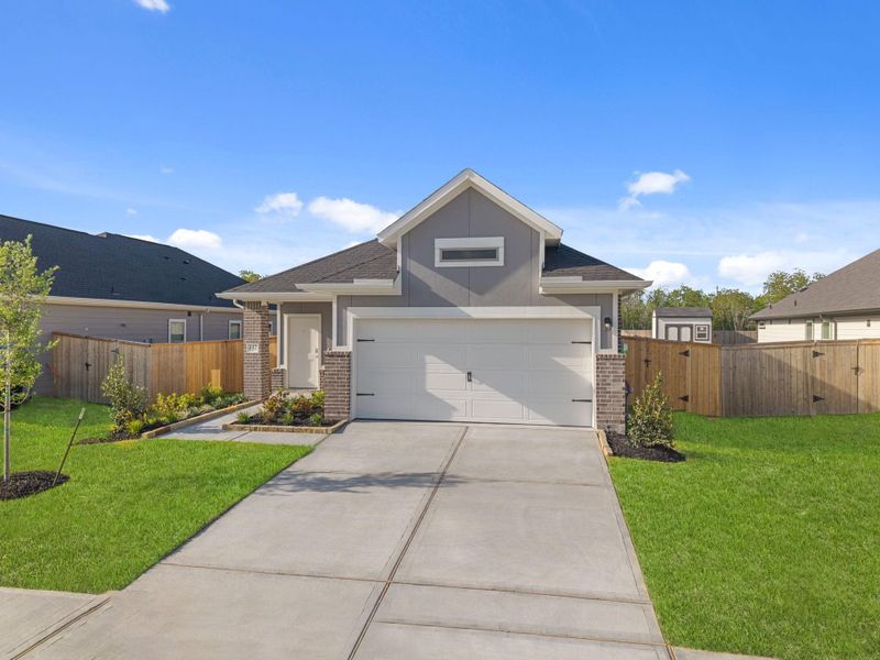 Front exterior of a new home in Laurel Landing, Alvin, TX, highlighting curb appeal (Image 21).